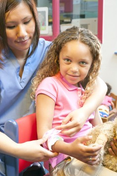 nurse caring for child